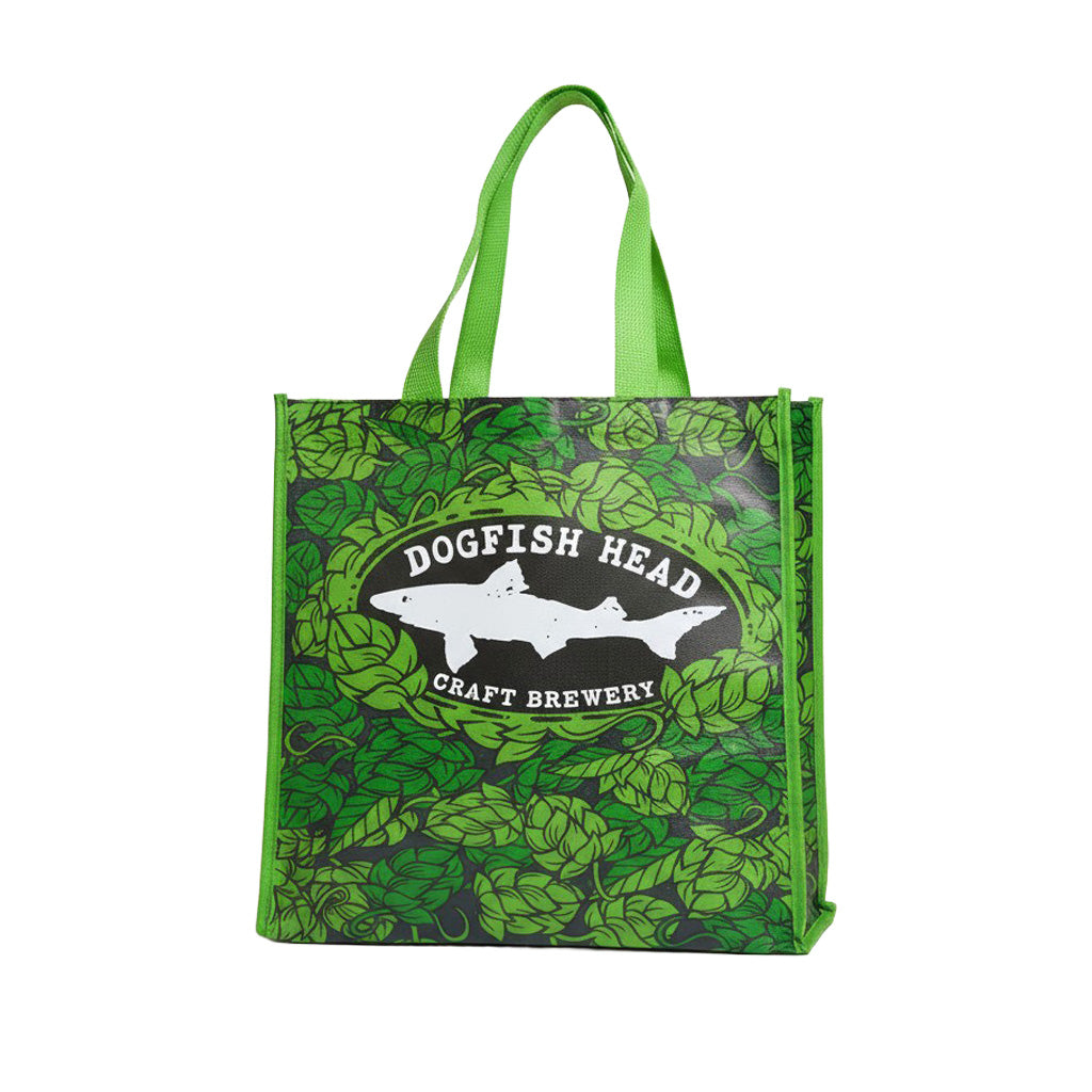 Front view of Dogfish Head reusable tote bag with green hop leaf design, white fish logo, and “Dogfish Head Craft Brewery” branding, durable shopping bag.