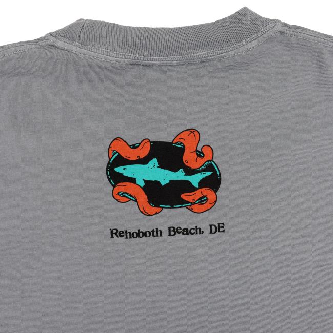 The GO WEST T-SHIRT COMPANY Granite Kraken Short Sleeve Tee features a gray design with a teal shark and orange tentacles above "Rehoboth Beach, DE.