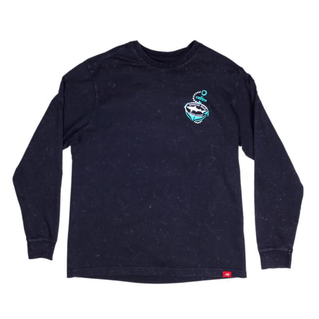 The Sportiqe Apparel Co. Asphalt Anchor Bono Long Sleeve Tee is a black vintage shirt with a small turquoise and white surfboard and wave graphic on the upper left chest, crew neckline, red hem tag, and subtle Dogfish Head style.