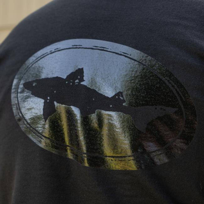 The GO WEST T-SHIRT COMPANY Black Off Centered Crew Sweatshirt features a glossy oval shark silhouette design, crafted from a soft cotton-polyester blend for lasting comfort.