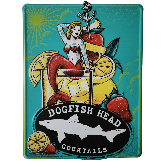 A vintage-style Canned Cocktails Tin Tacker by Merchtank features a tattooed mermaid in a cocktail glass with ice and fruit. "Canned Cocktails" text appears above a shark silhouette logo—perfect nautical wall decor.