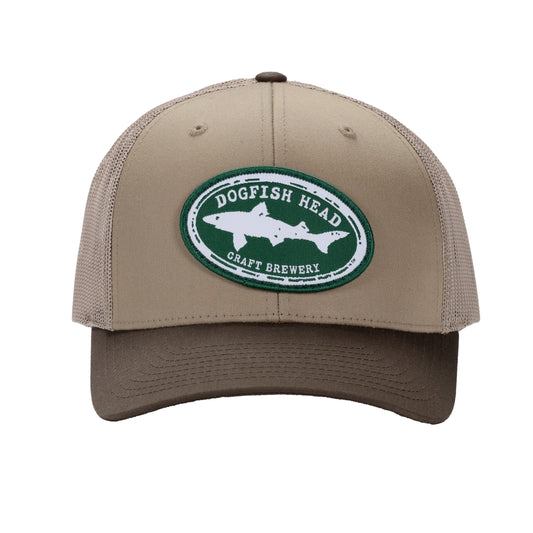 Front, side, and back views of a brown and khaki Dogfish Head Richardson trucker hat featuring a green oval Dogfish Head Craft Brewery patch on the front and a mesh back with adjustable snapback closure.
