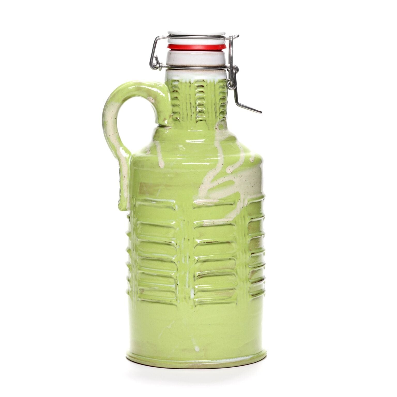 The Citrus Green Ceramic Growler by Romanick Pottery features a handle, textured vertical ridges, and a metal swing-top lid with a red rubber seal, shown against a white background.