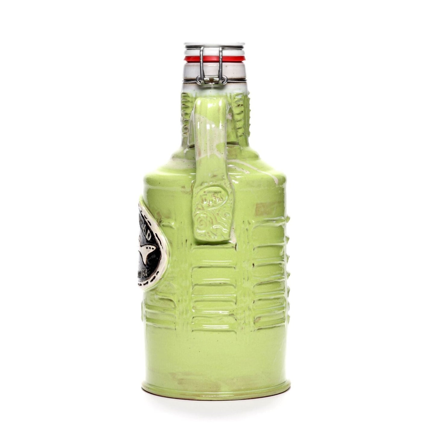 The Citrus Green Ceramic Growler by Romanick Pottery, hand crafted with a handle, metal clasp lid, and silver emblem on the side, stands upright against a white background.