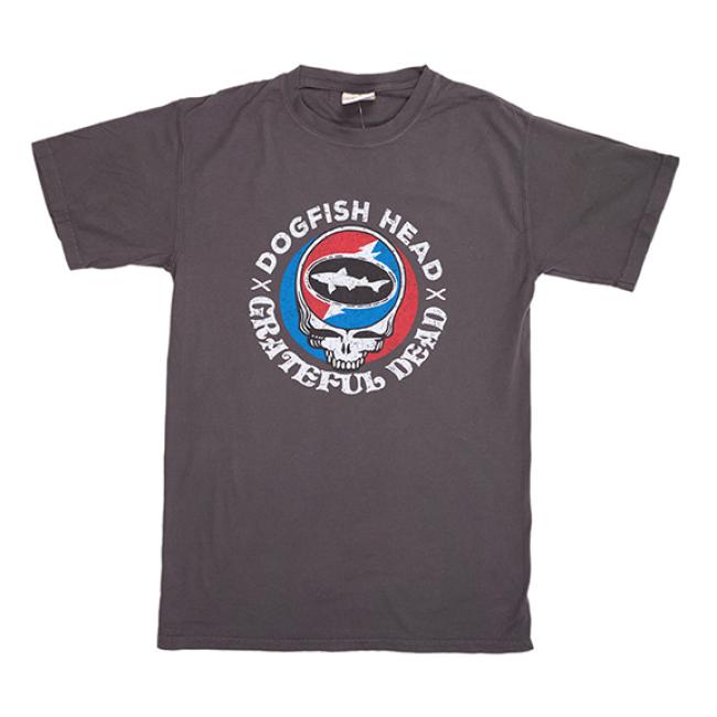 The Dogfish Head x Grateful Dead Dark Grey Short Sleeve Tee by GO WEST T-SHIRT COMPANY features a skull with a shark in a red and blue circle, plus band and brewery text—ideal for craft beer tee collectors and music fans.