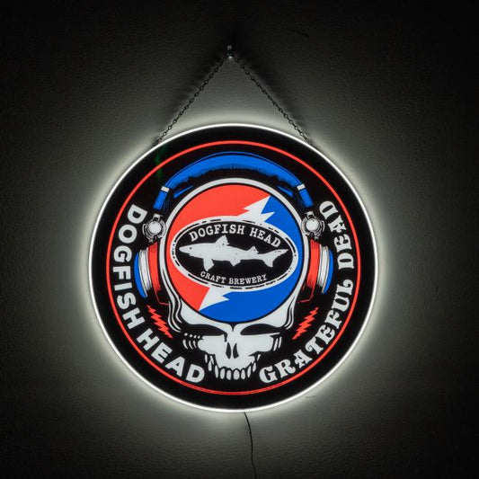 The Firebolt Group Dogfish Head x Grateful Dead LED Sign features a skull with a red and blue lightning bolt in headphones, reading "Dogfish Head Craft Brewery" and "Grateful Dead"—ideal for bar decor.