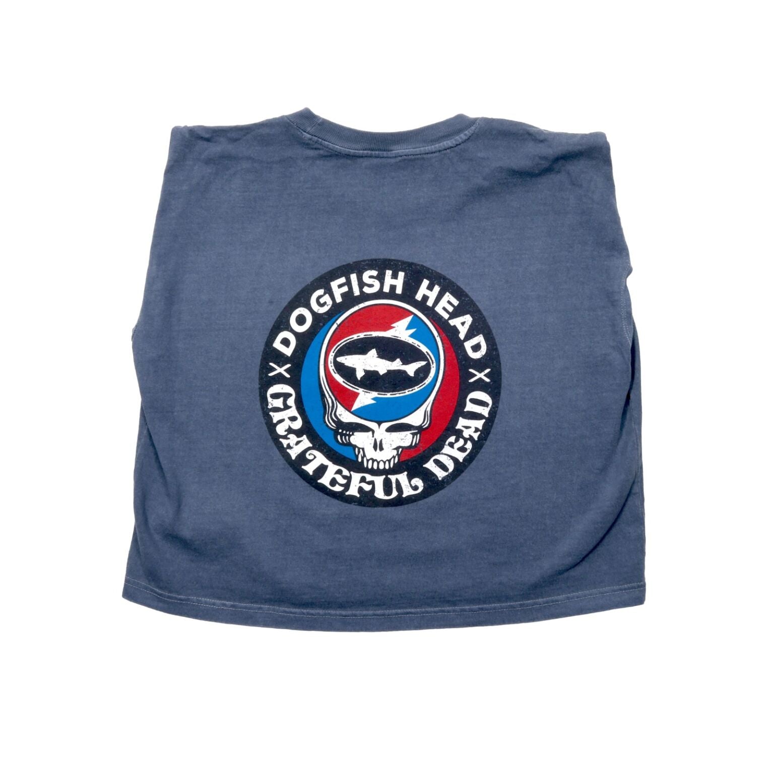 Back view of the Dogfish Head x Grateful Dead muscle tee with collaboration logo featured in large on the back. The collaboration logo is a circle bordered in black with writing "Dogfish Head x Grateful Dead". The inside of the circle is half red and half blue with a white skull in the center. In the skulls head there is a white lightning bolt with the Dogfish Head shark and shield logo on it.