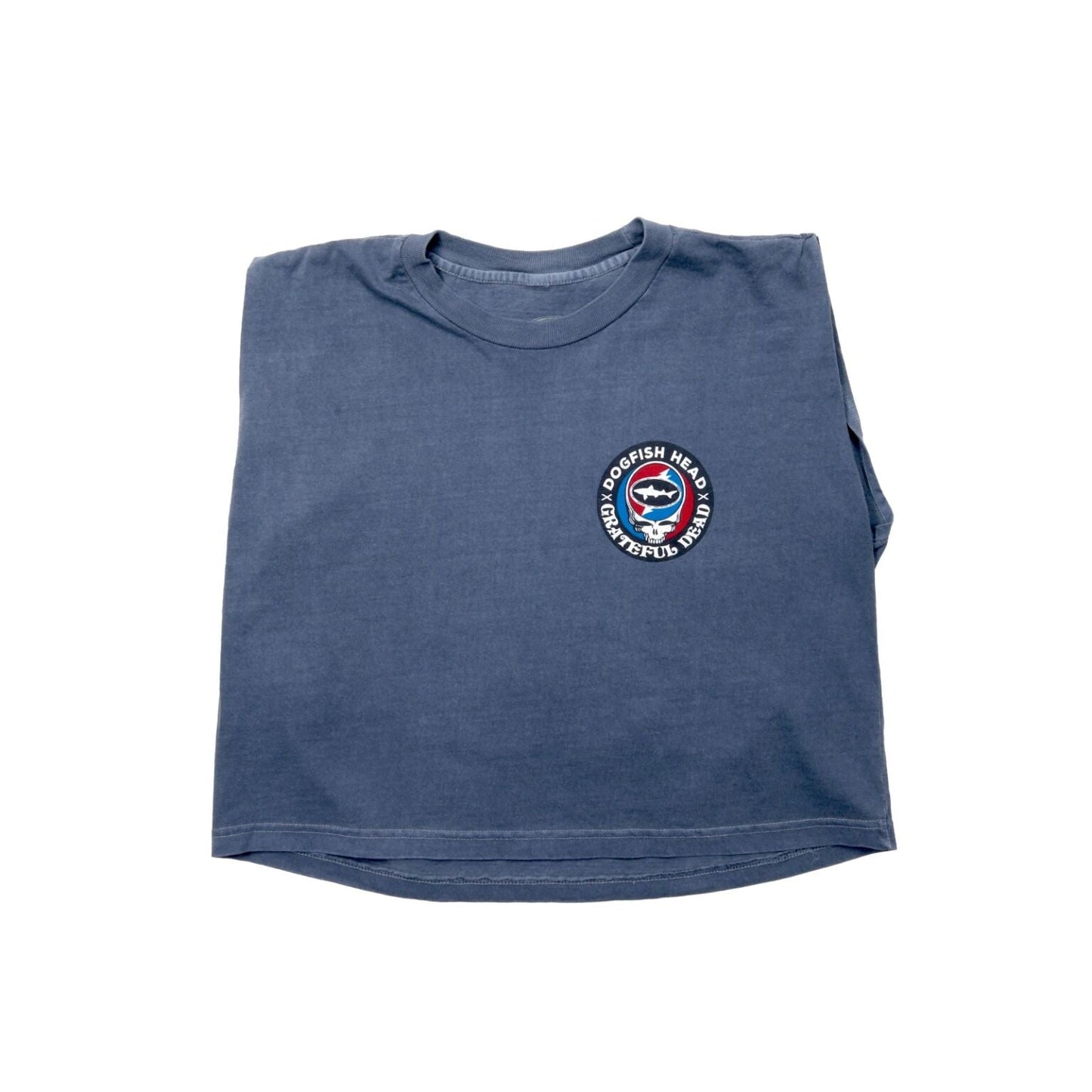 Front view of the Dogfish Head x Grateful Dead muscle tee with collaboration logo featured on the left side of the chest. The collaboration logo is a circle bordered in black with writing "Dogfish Head x Grateful Dead". The inside of the circle is half red and half blue with a white skull in the center. In the skulls head there is a white lightning bolt with the Dogfish Head shark and shield logo on it.