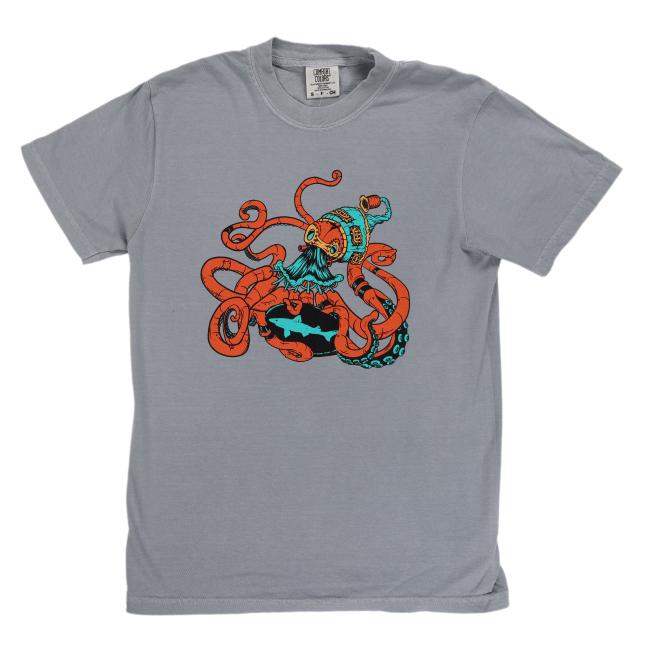 The Granite Kraken Short Sleeve Tee by GO WEST T-SHIRT COMPANY showcases a gray steampunk design with a giant orange cartoon kraken battling a blue-and-black superhero with a yellow bat symbol, tentacles tightly wrapped around the hero.