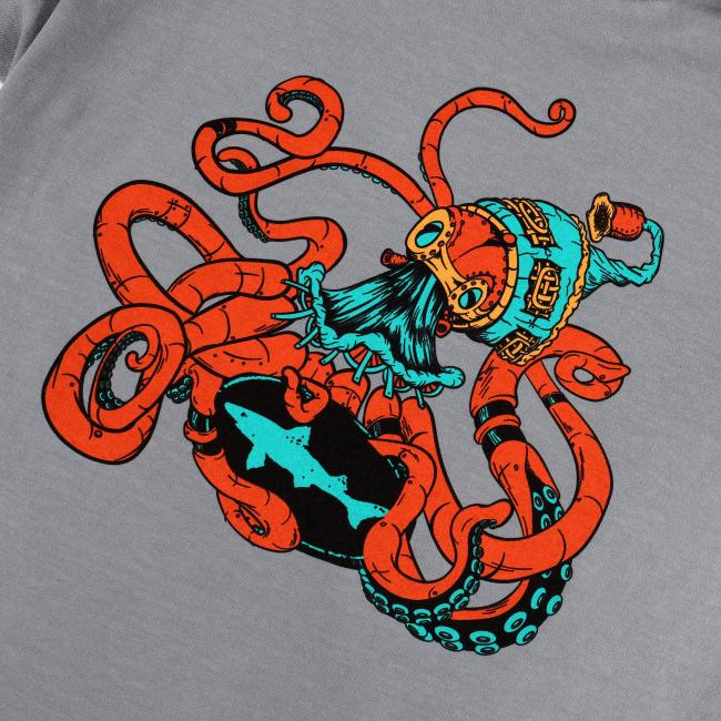 The Granite Kraken Short Sleeve Tee by GO WEST T-SHIRT COMPANY features a red steampunk kraken in a diver helmet with blue and gold accents, holding a black submarine, illustrated on a gray background.