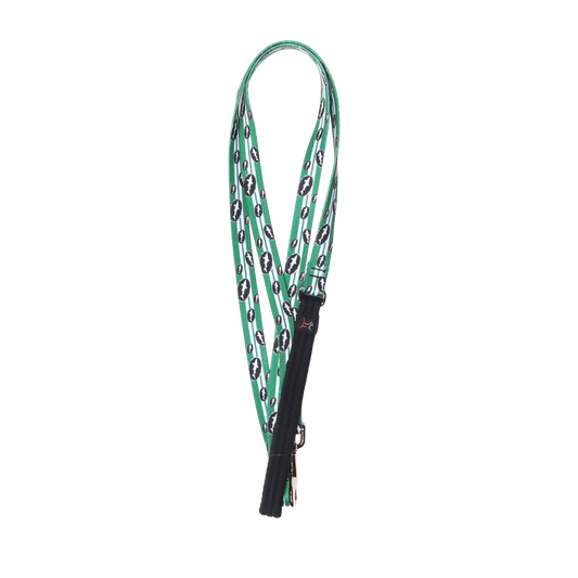 A Green Retro 6' Dog Leash by Lupine, Inc. with a repeating black-and-white oval pattern and black accents, displayed against a plain white background.
