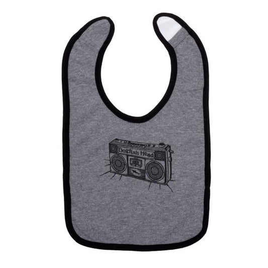 The Grey Boombox Bib by GO WEST T-SHIRT COMPANY is a gray, washable cotton toddler bib with black trim, featuring a black retro boombox line drawing labeled "Dogfish Head" on the front.