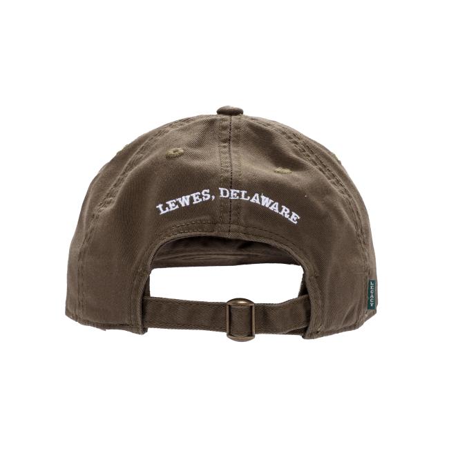 A brown INN Olive Dad Hat by L2 Brands shown from the back, with white “LEWES, DELAWARE” embroidery above an adjustable strap and metal buckle.