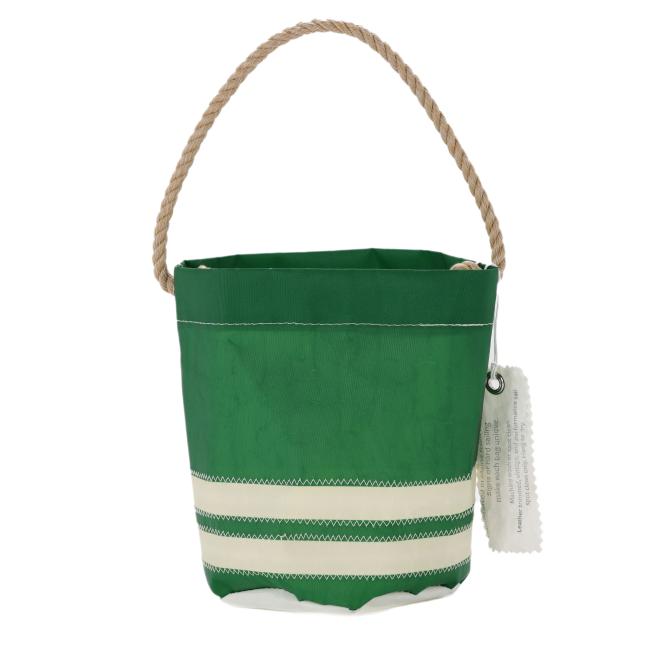 The Seabags INN Seabag Bucket Bag is a small, green and white striped bag with zigzag stitching and a tan rope handle. Handcrafted in Maine from recycled sail materials, it includes a white tag with text on the handle.