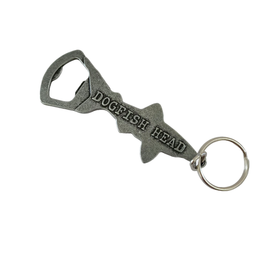 Silver keychain opener shaped as a shark with writing "Dogfish Head" on it.