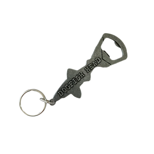 Silver keychain opener shaped as a shark with writing "Dogfish Head" on it.