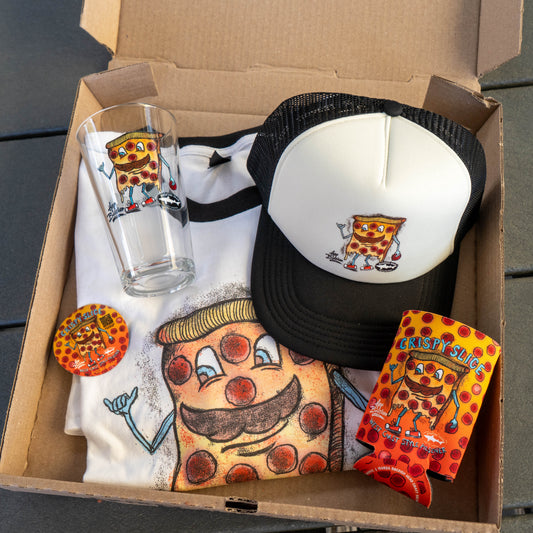 The Crispy Slice Merch Bundle by GO WEST T-SHIRT COMPANY features a pizza tee, black and white trucker hat, pint glass, button, and can cooler—each with a cartoon pizza slice character with mustache and arms.