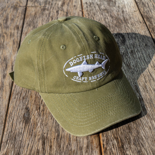 Olive colored dad hat with a white Dogfish Head Craft Brewery embroidered logo.