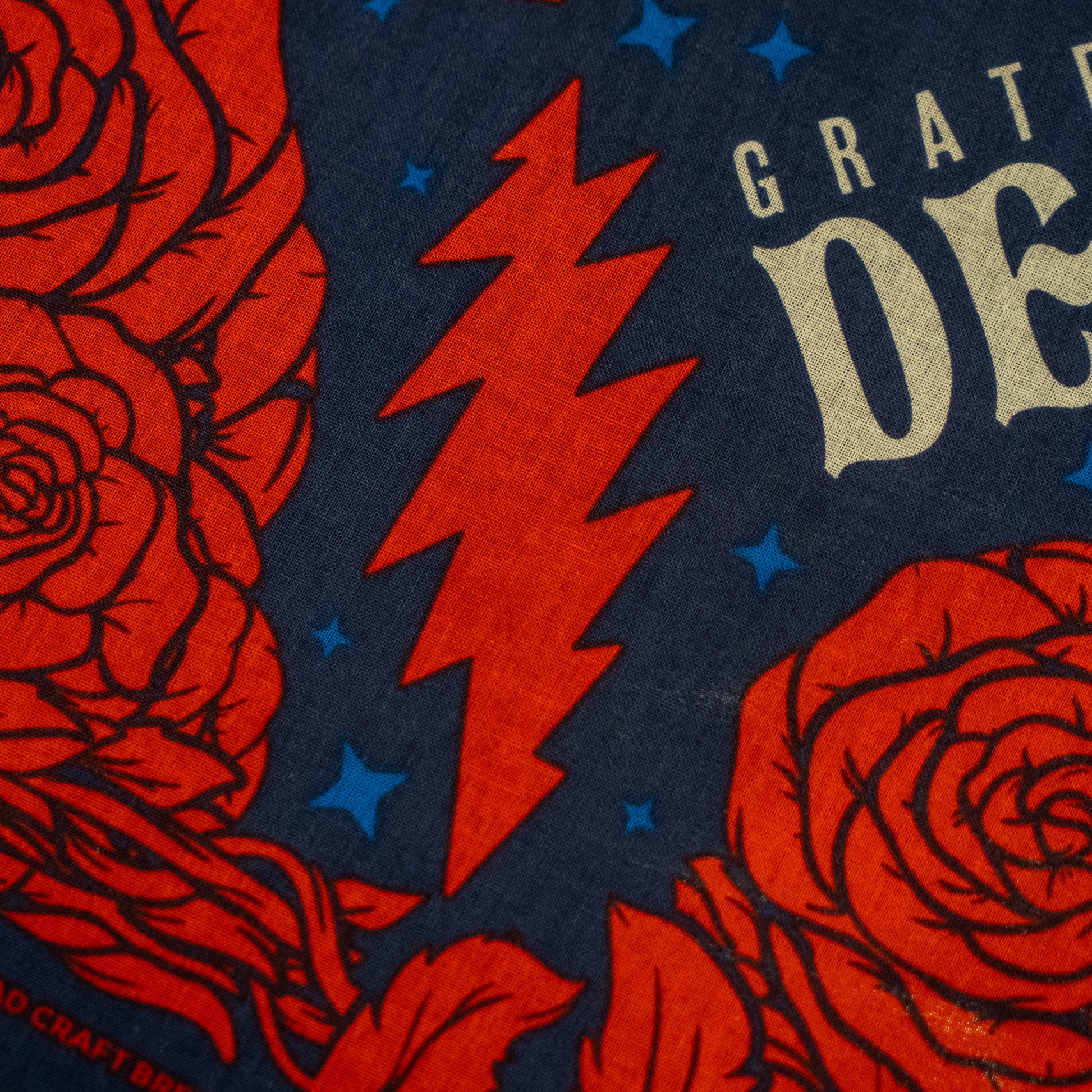 Close up of red grateful dead lightning bolt design 