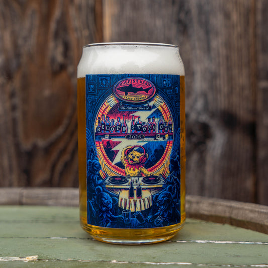 Dogfish Head x Grateful Dead 2026 Record Store Day can glass filled with beer, featuring colorful RSD artwork and DJ bear illustration.