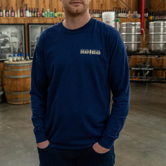 Front view of Dogfish Head x Grateful Dead navy long sleeve RSD tee worn by model, featuring relaxed fit and subtle chest logo.