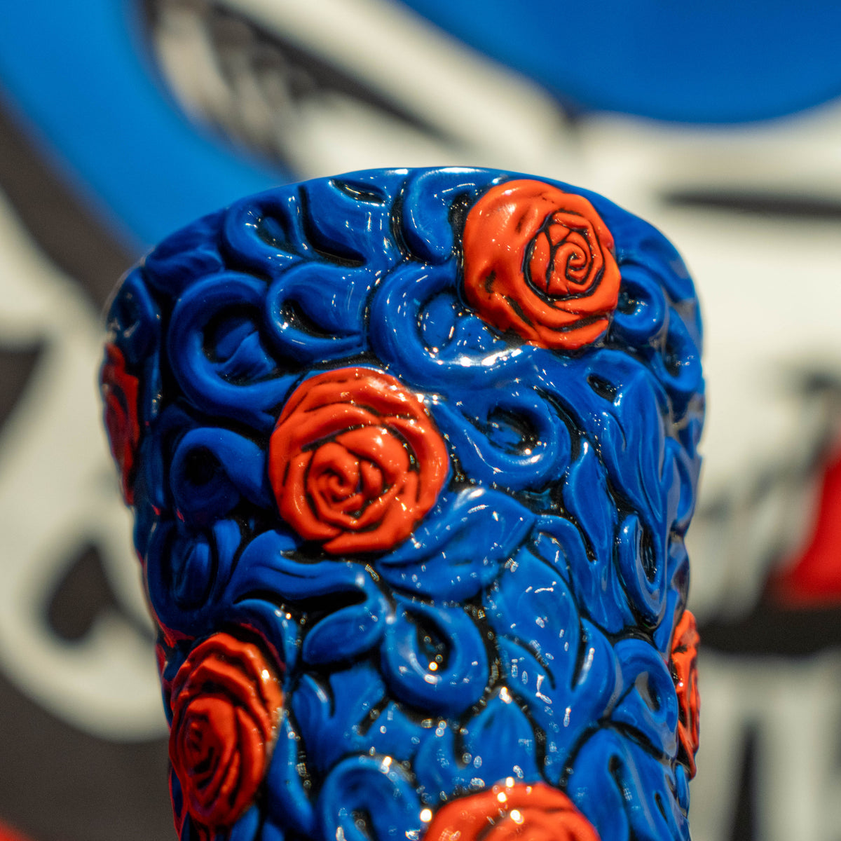 Blue Dogfish Head x Grateful Dead TIKI FARM ceramic mug embossed with a repeating pattern of orange roses and swirling vines.