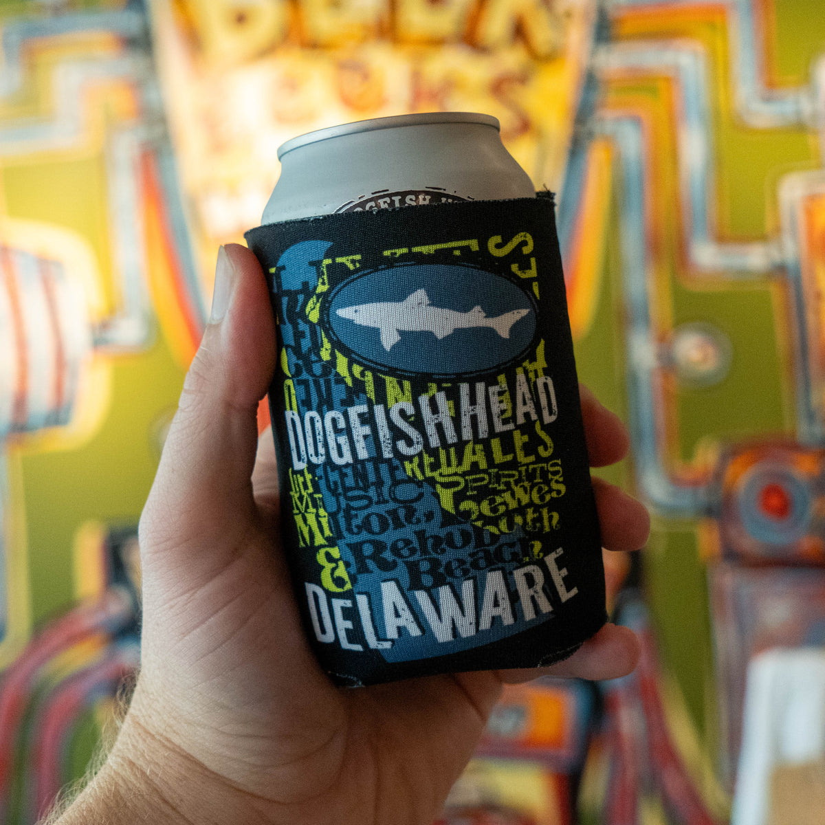 Can Cooler holding can of Dogfish Head Beer with the state of Delaware on the front.