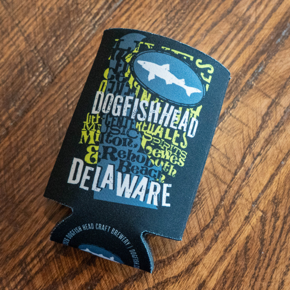 Can Cooler holding can of Dogfish Head Beer with the state of Delaware on the front.