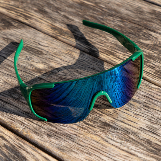 Green Dogfish Head Polarized Sunglasses with Cool tone, blue and purple reflection on the lenses