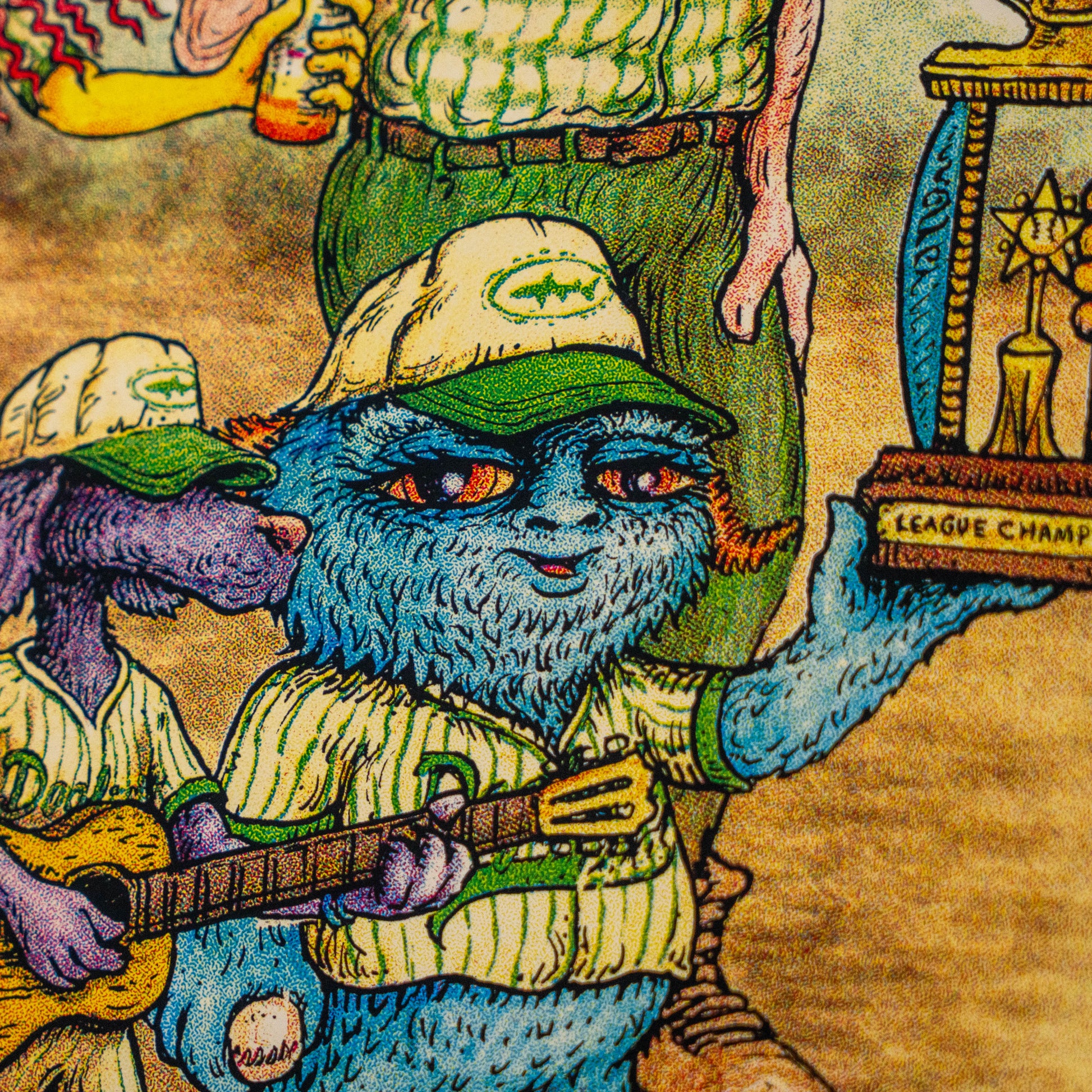 The League Champions Limited-Edition Print by Marq Spusta features cartoon-style animals in baseball uniforms: a blue, furry character proudly holding a League Champion trophy and another playing guitar. Both wear yellow hats with green brims, while an adult figure stands behind them. Inspired by Marq Spusta’s collectible print style, this playful scene perfectly captures the whimsical and festive spirit of a Dogfish Head celebration.
