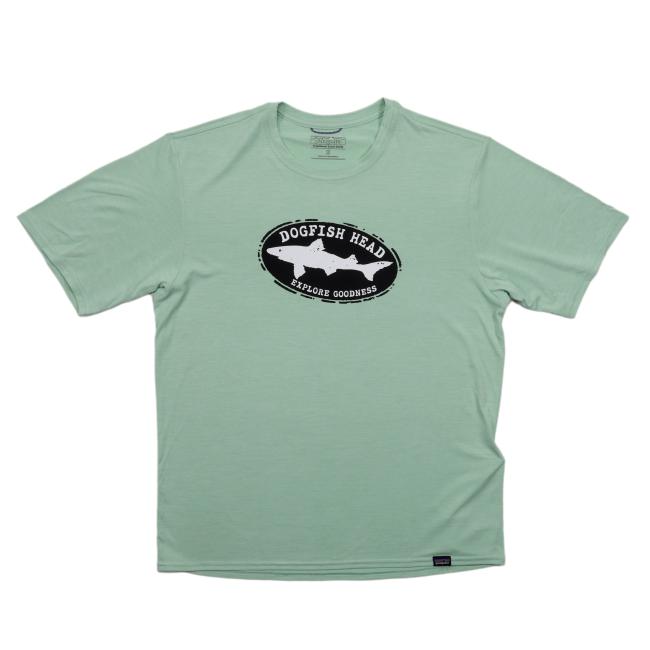 The Patagonia Teal Short Sleeve Runner is a moisture-wicking tee featuring a black oval logo with white dogfish silhouette and Dogfish Head Explore Goodness text, designed for all-day comfort.