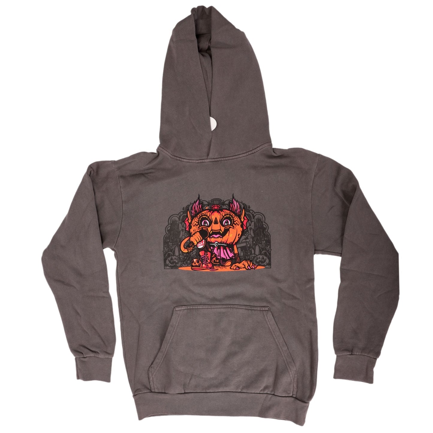 The Punkin Pullover Hoodie by GO WEST T-SHIRT COMPANY is a charcoal gray oversized hoodie with a front pocket, hood, and a colorful Drew Millward cartoon of an orange two-headed monster in pink clothes on the back.