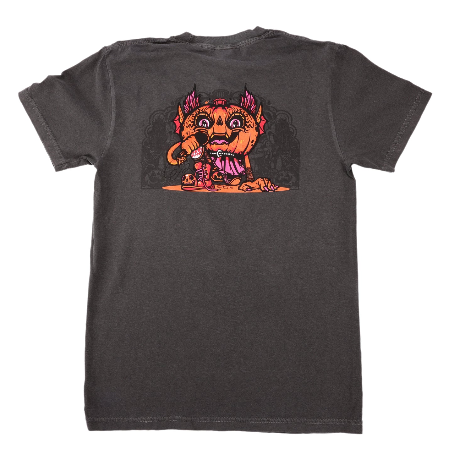 The Punkin Short Sleeve Tee by GO WEST T-SHIRT COMPANY is a dark gray Comfort Colors shirt with a playful cartoon of a multi-eyed orange monster holding a mic on the back—a fun, garment-dyed seasonal addition to your wardrobe.