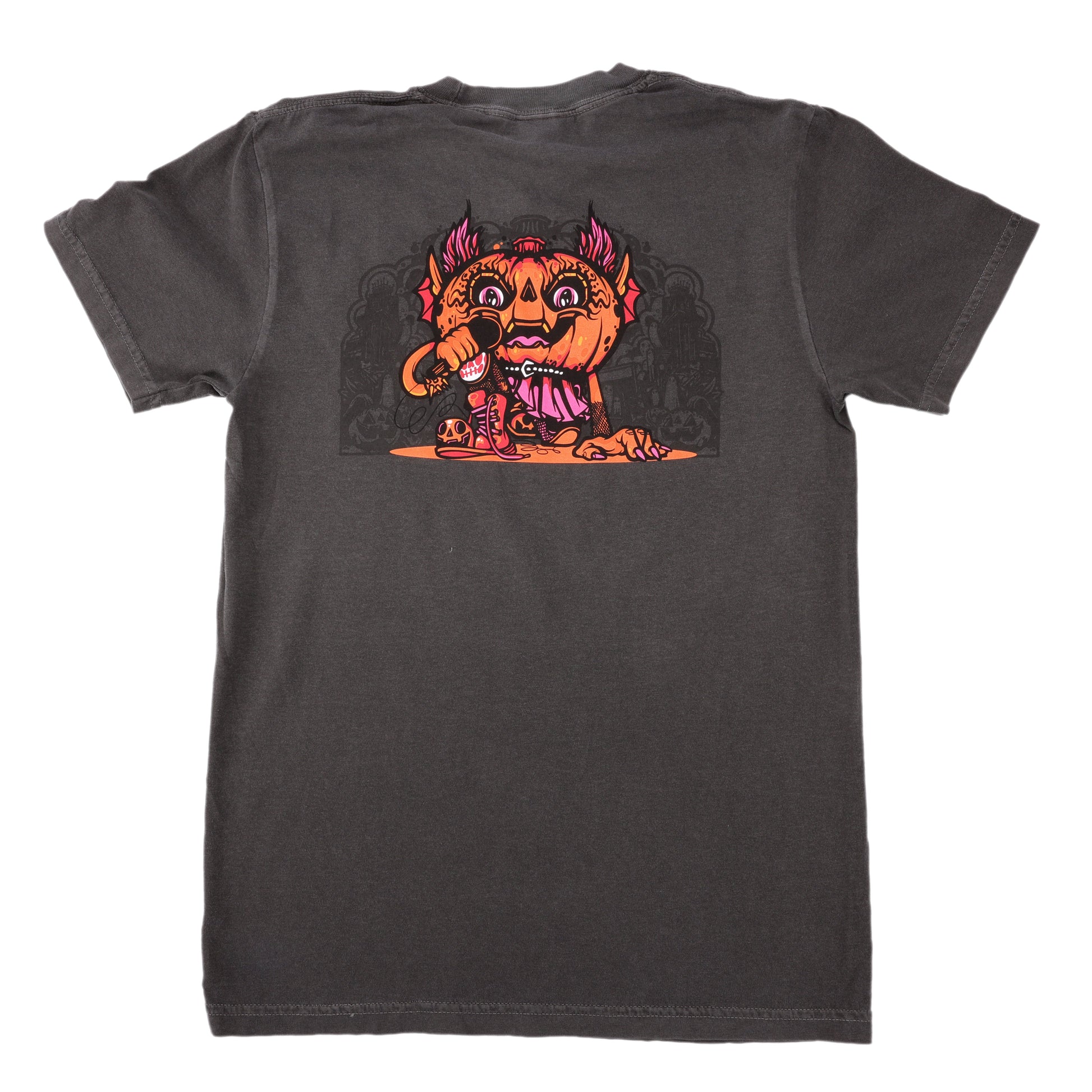 The Punkin Short Sleeve Tee by GO WEST T-SHIRT COMPANY is a dark gray Comfort Colors shirt with a playful cartoon of a multi-eyed orange monster holding a mic on the back—a fun, garment-dyed seasonal addition to your wardrobe.