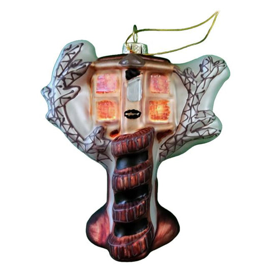 The Bottoms Up Treehouse Ornament features a cozy treehouse with glowing windows, spiral staircase, and brown-accented branches hanging by a gold string—ideal for fans of craft beer ornaments and holiday charm.