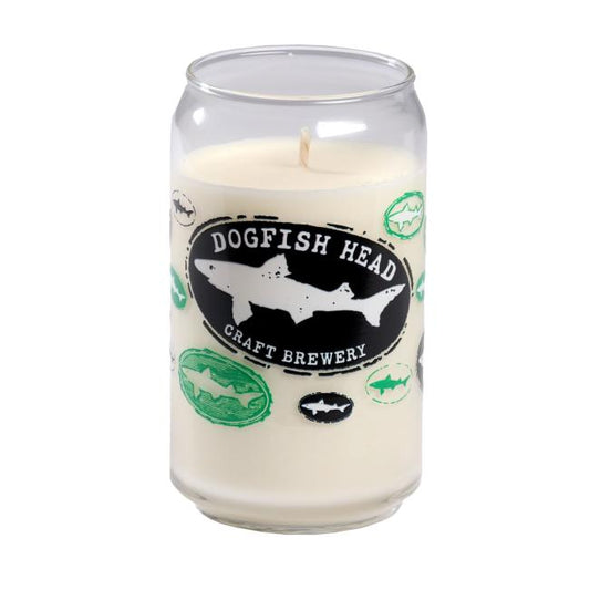 The Vanilla Core Logo Candle by Unwined Candles, LLC is a white soy candle in a reusable glass shaped like a beer can, featuring the Dogfish Head Craft Brewery logo with green and black fish and ovals for eco-friendly style.