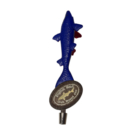 Blue and red shark shark shaped tap handle. Image shows blue side with circular wooden style Dogfish Head shark and shield logo.