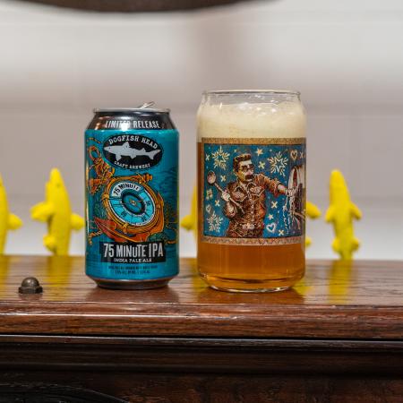 Front view of glass with Jon Langford artwork next to 75 Minute IPA can.