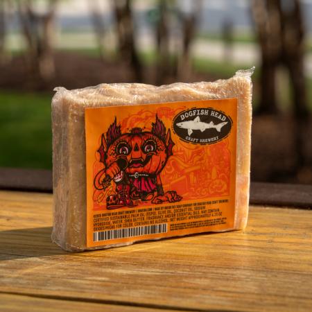 Front view of bar of soap featuring label with Punkin artwork, Dogfish Head shark and shield logo, and ingredients list.
