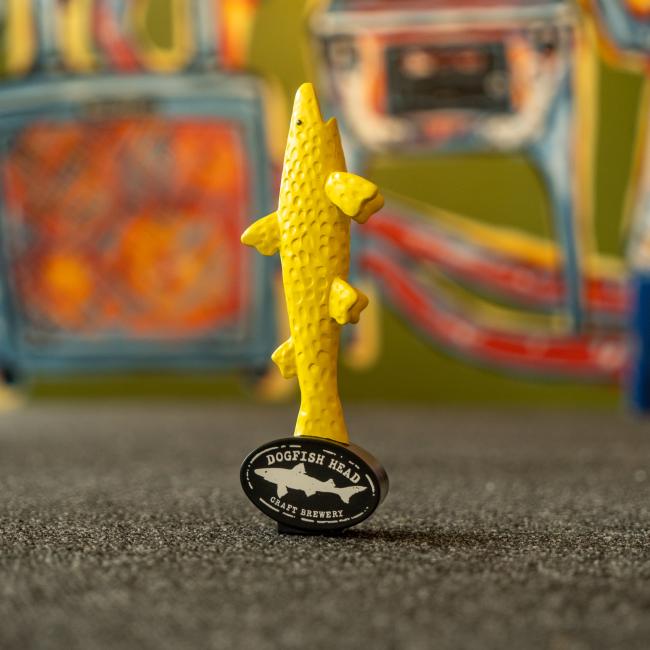 Yellow shark tap handle shown off tap standing up.