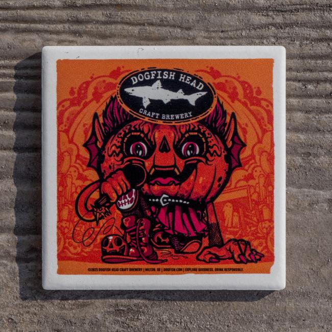 Orange coaster with white border. Has Punkin artwork on it with the Dogfish Head shark and shield logo up top.