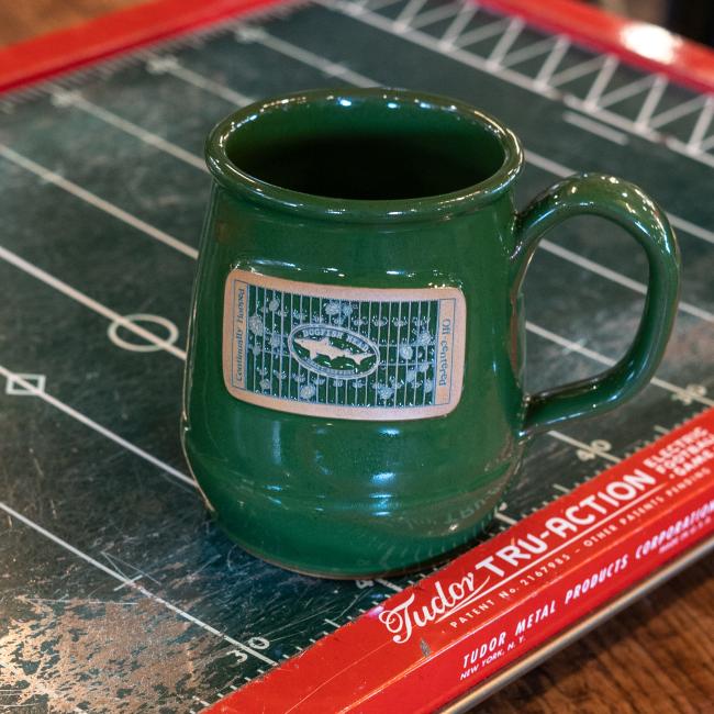 Green ceramic Mug with football inspired emblem and DFH Logo
