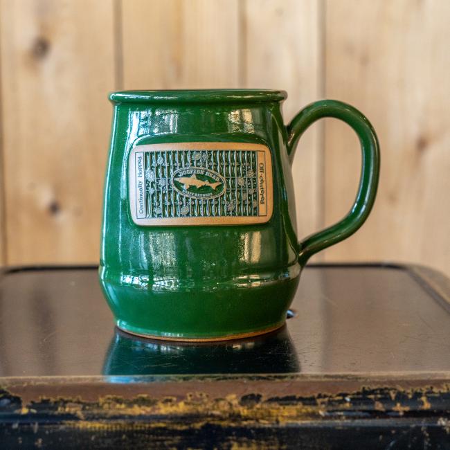 Green ceramic Mug with football inspired emblem and DFH Logo