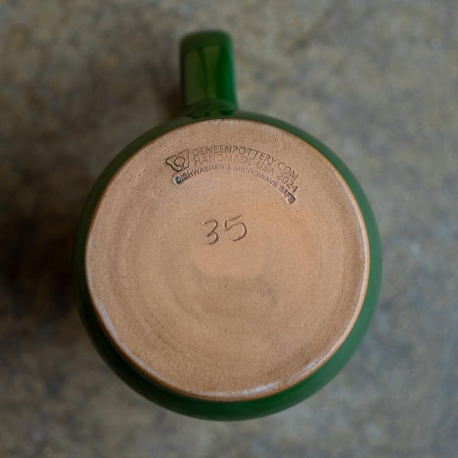 Hand numbered bottom of ceramic mug