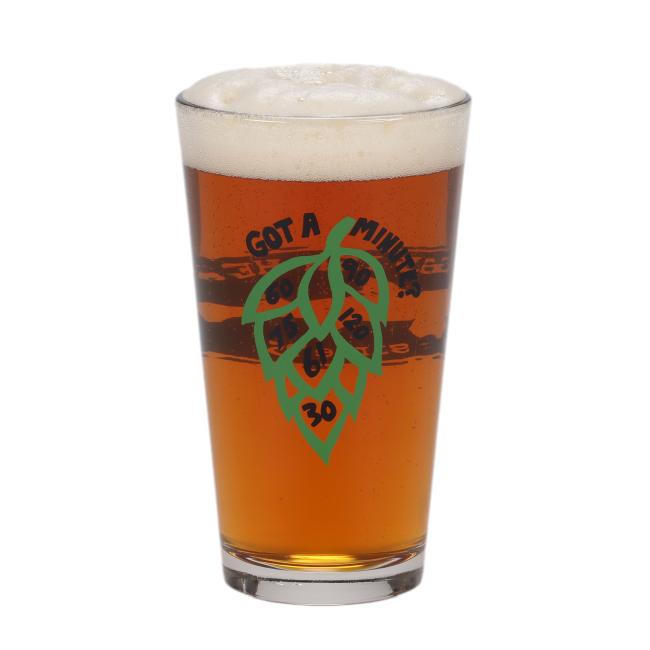 16oz standard pint filled with beer featuring black Dogfish Head Shark & Shield logo on one side and a Got A Minute Hop design on the other side. Hop design is filled in with minute series numbers.
