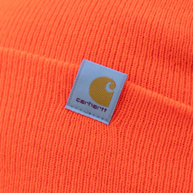 Close-up of the small Carhartt logo which is featured on the left side of the beanie.