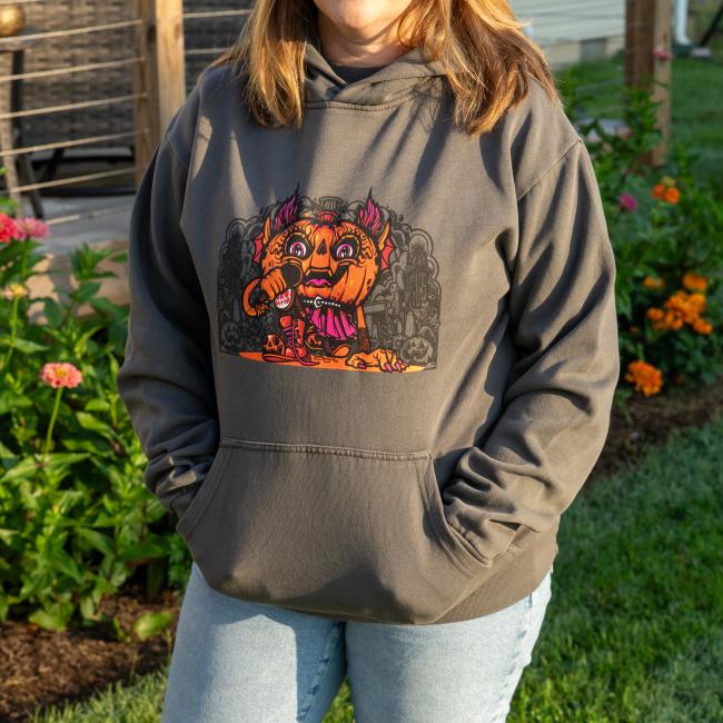 Front view of hoodie with orange punkin imagery. 