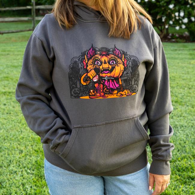 Front view of hoodie with orange punkin imagery. 