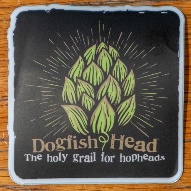 Black sticker with green hophead logo on it. With writing 