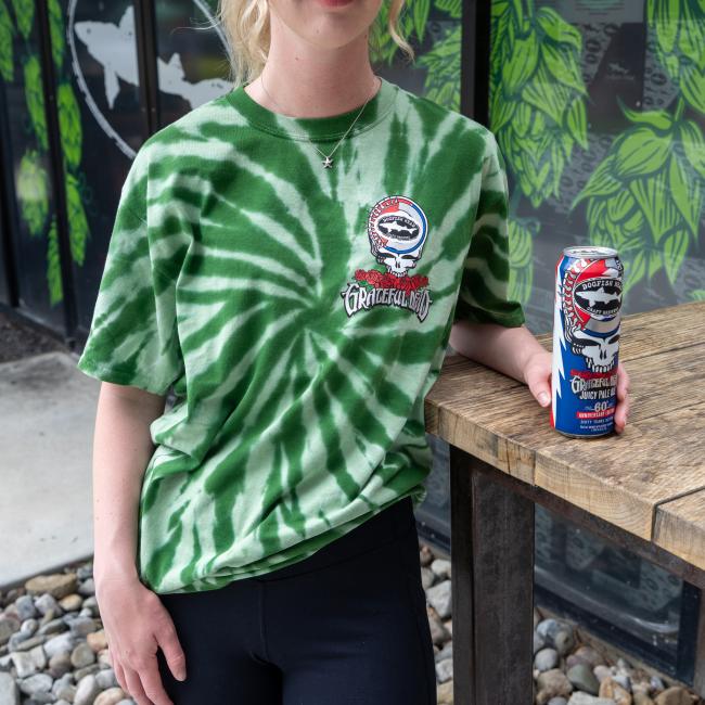Front of green tie-dye tee with Dogfish Head logo in the Grateful Dead skull and roses on left side of chest.